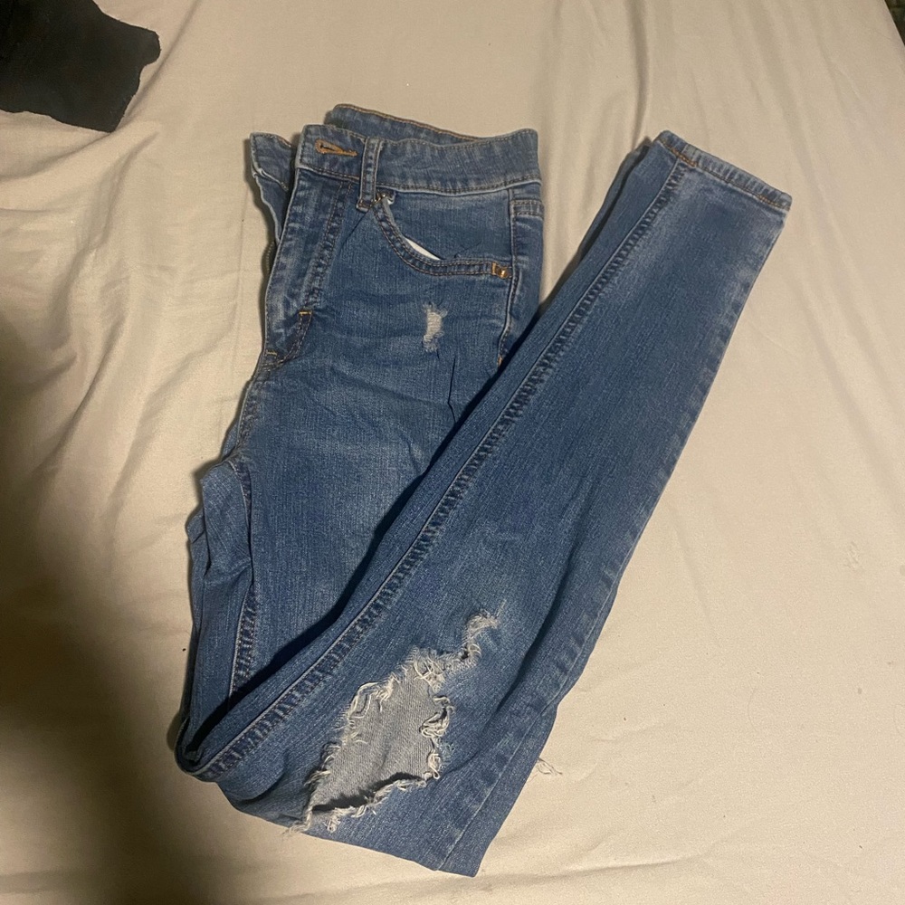 Blue ripped jeans